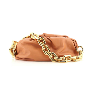 The Size Guide: Bottega Veneta Pouch - The Vault