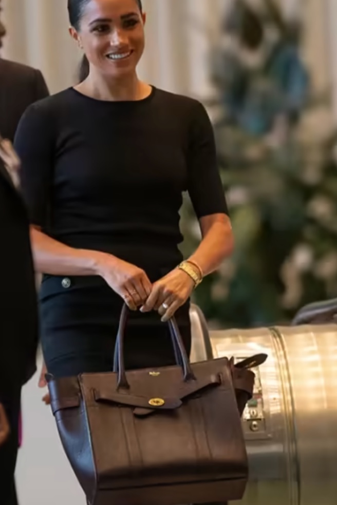 Strathberry - Katie Holmes carries the East/West Mini in